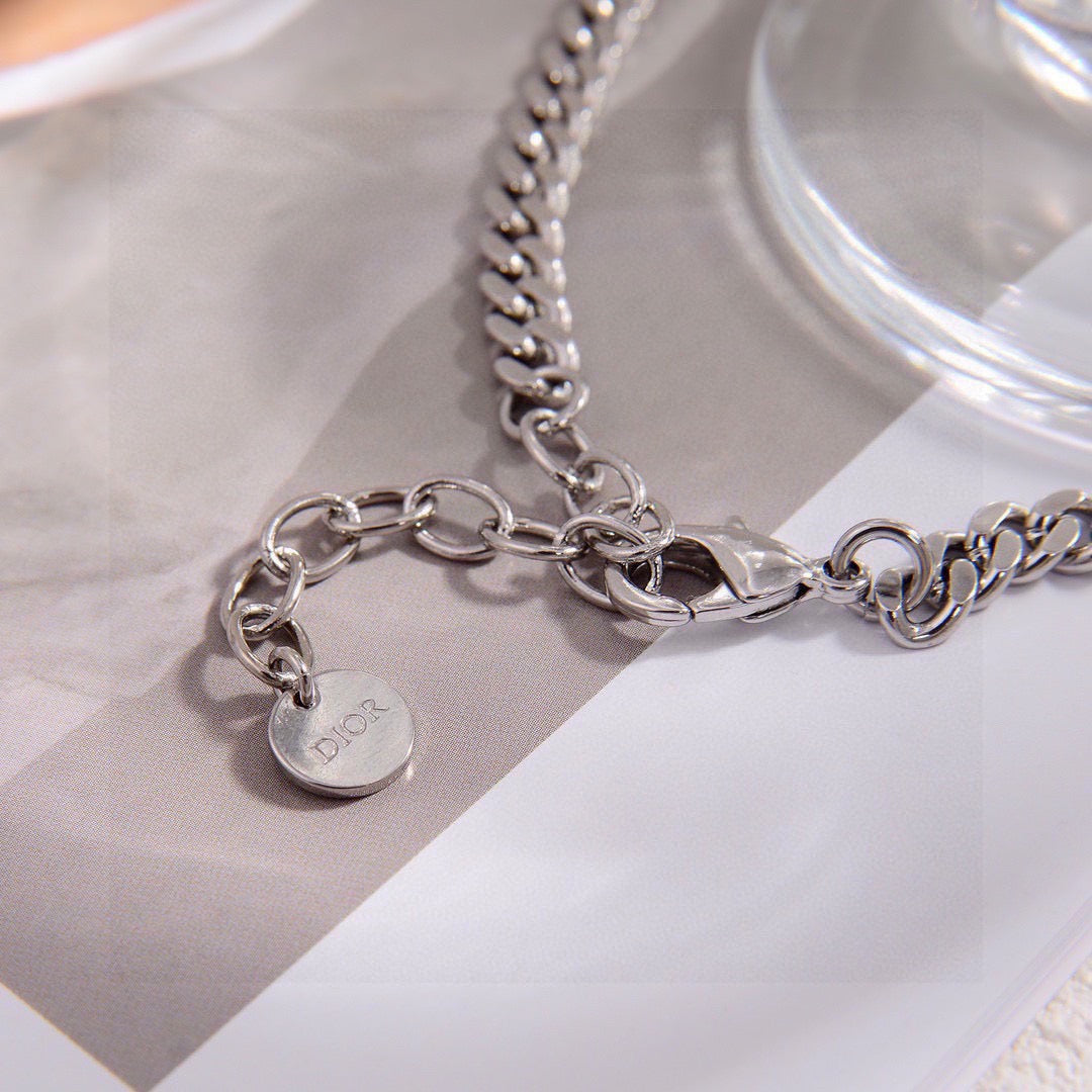 Martin Graham pendant necklace in polished metal-tone – detail view