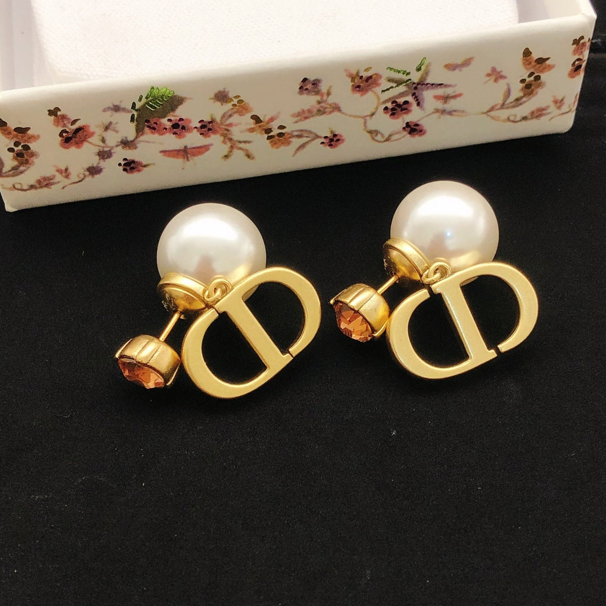 Martin Graham stud earrings in polished metal-tone – detail view
