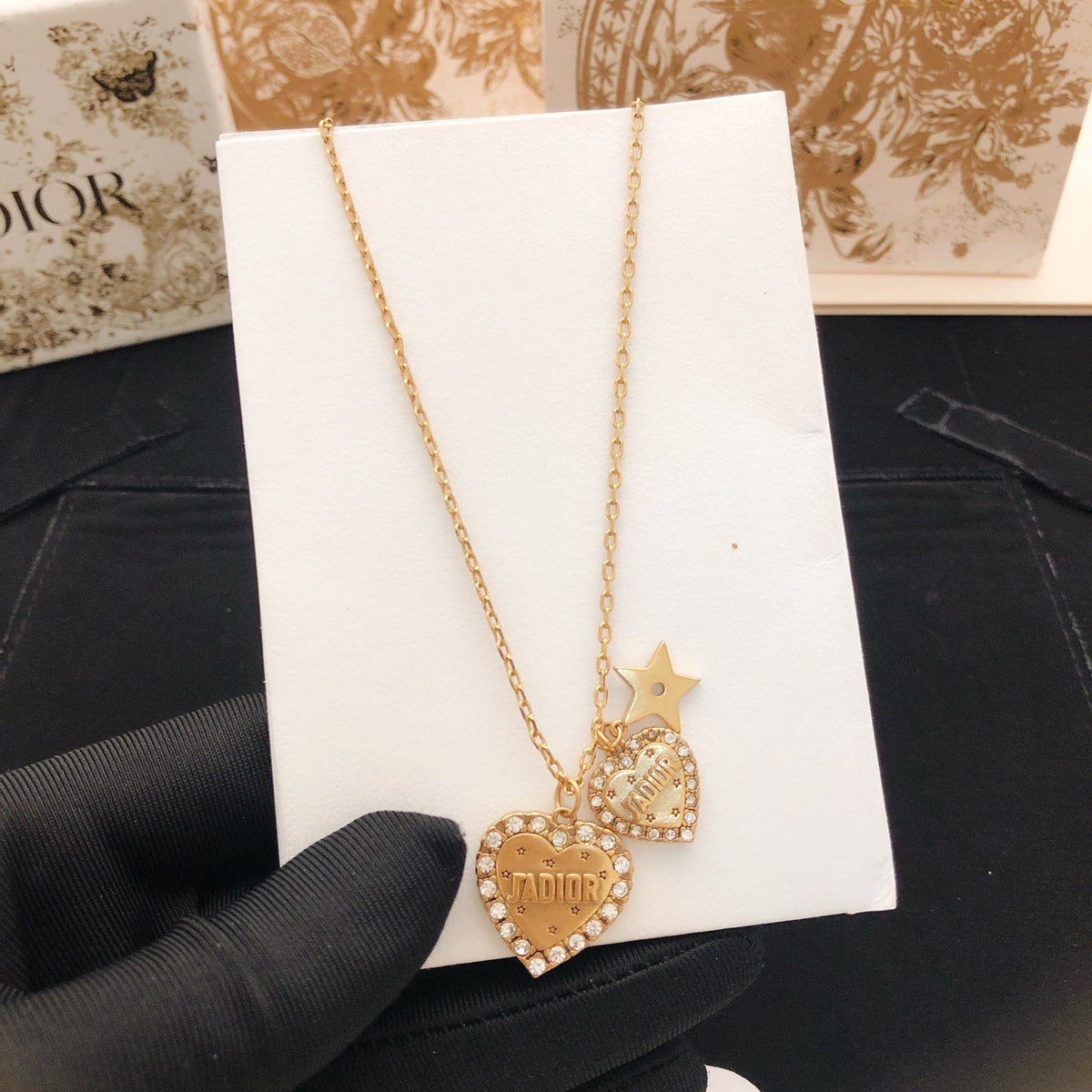 Martin Graham pendant necklace in polished metal-tone – detail view