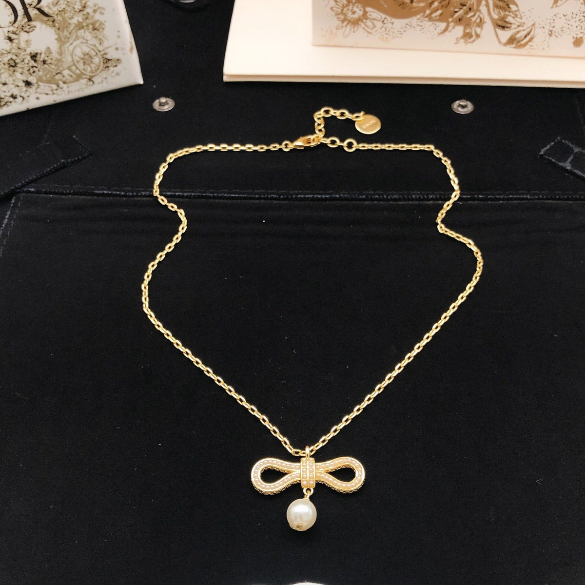 Martin Graham pendant necklace in polished metal-tone – detail view