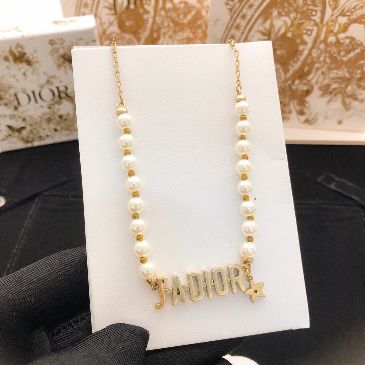 Martin Graham pendant necklace in polished metal-tone – detail view