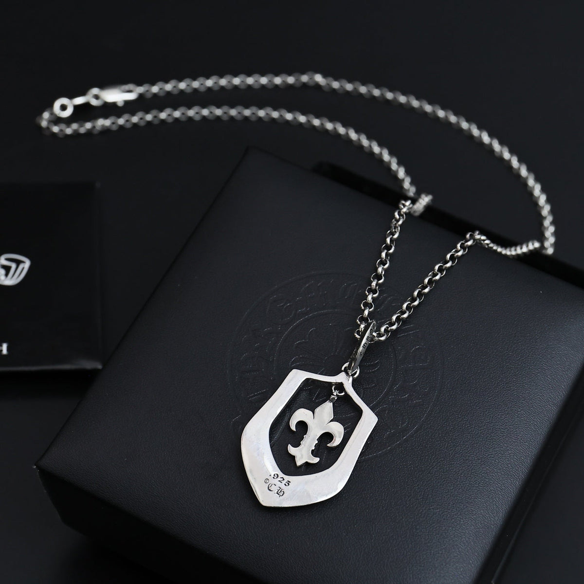 Martin Graham pendant necklace in polished metal-tone – detail view