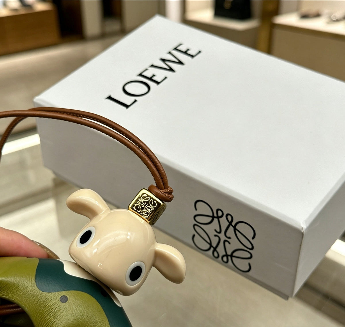 Martin Graham bag charm in polished metal-tone – detail view