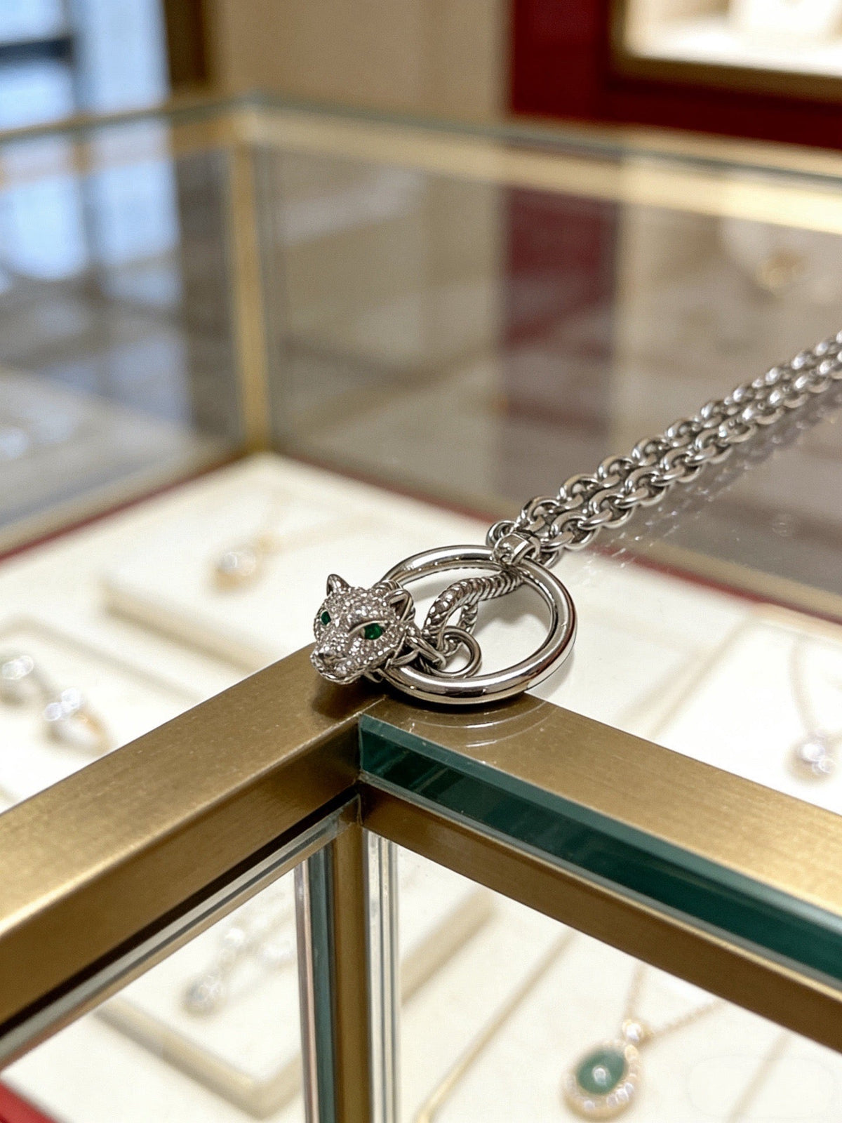 Martin Graham pendant necklace in polished metal-tone – detail view