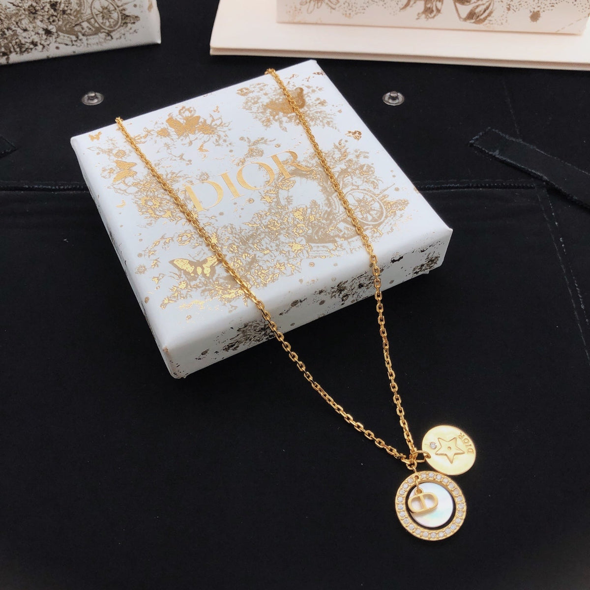 Martin Graham pendant necklace in polished metal-tone – detail view