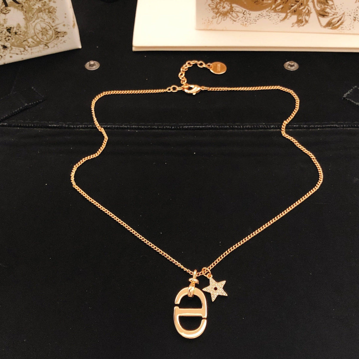 Martin Graham pendant necklace in polished metal-tone – detail view