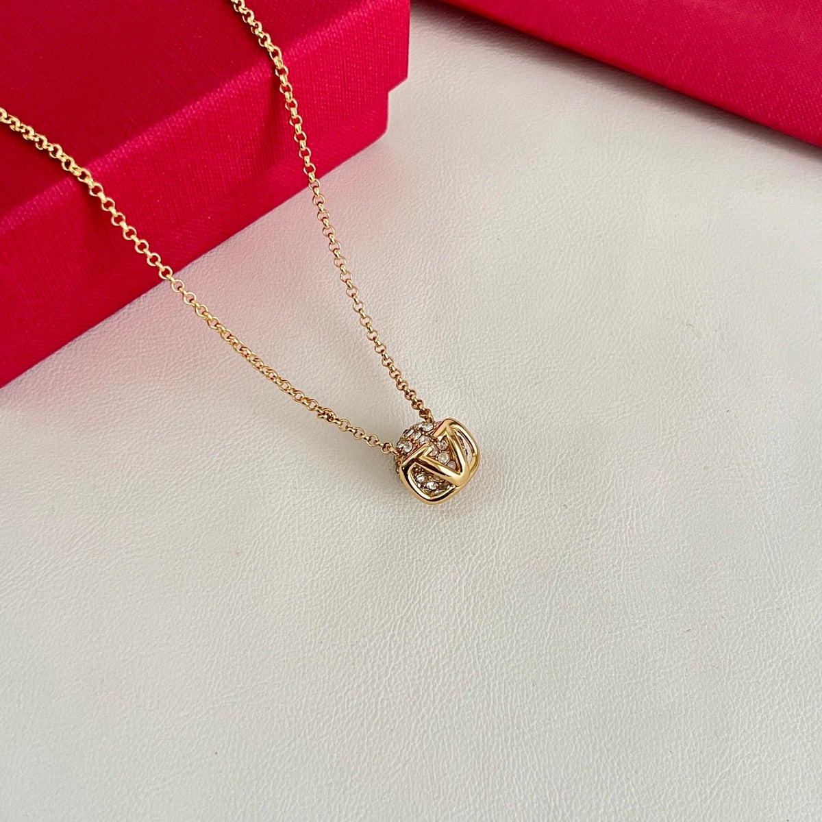 Martin Graham pendant necklace in polished metal-tone – detail view