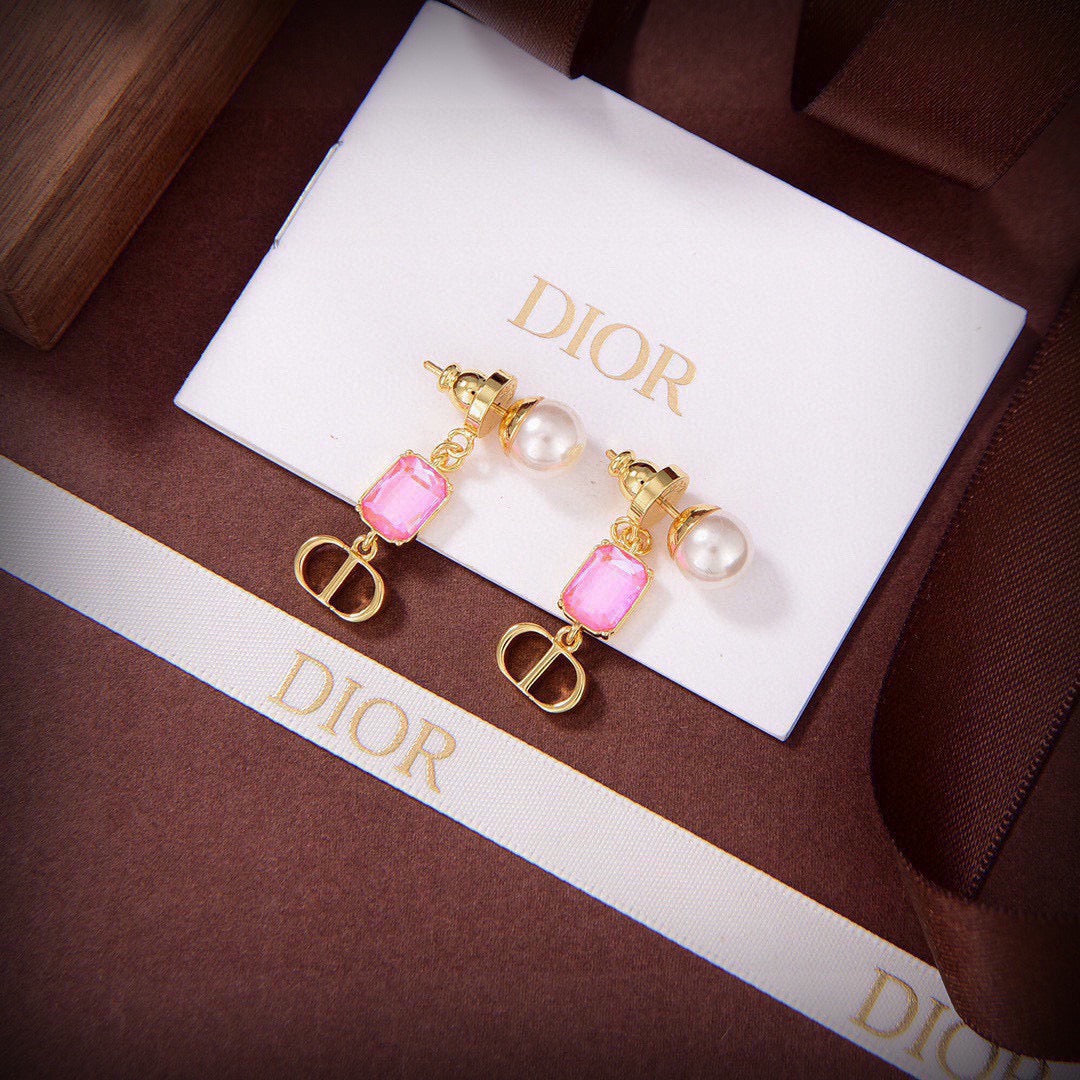 Martin Graham stud earrings in polished metal-tone – detail view