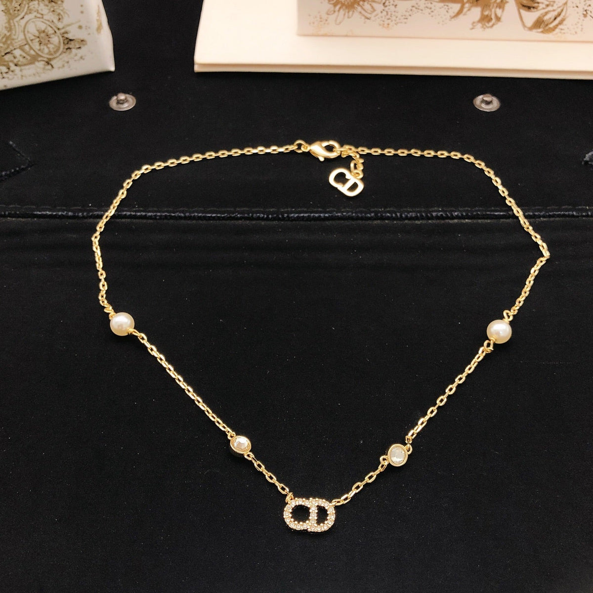 Martin Graham pendant necklace in polished metal-tone – detail view