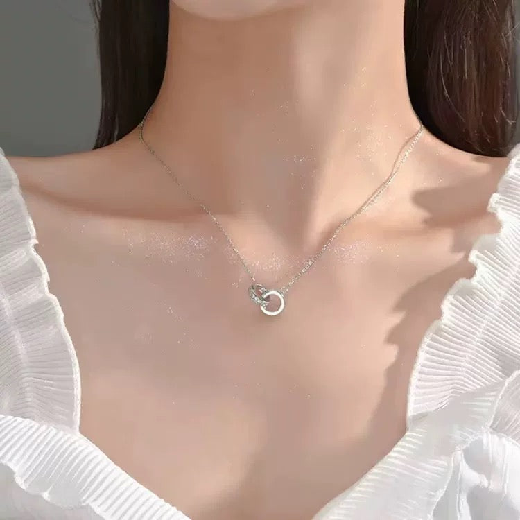 Martin Graham pendant necklace in polished metal-tone – detail view