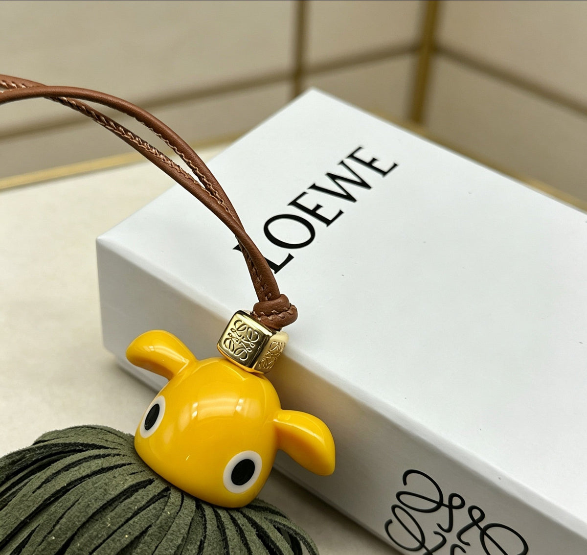 Martin Graham bag charm in polished metal-tone – detail view