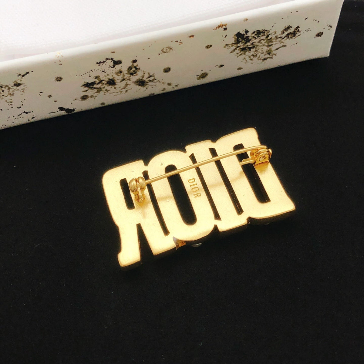Martin Graham brooch in polished metal-tone – detail view