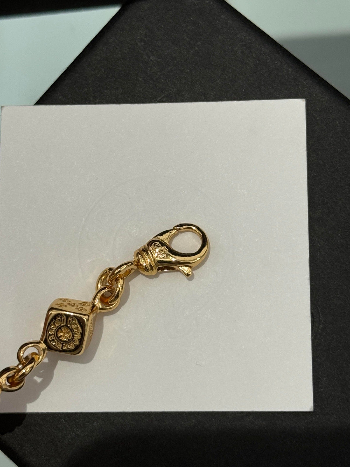 Martin Graham jewelry accessory in polished metal-tone – detail view