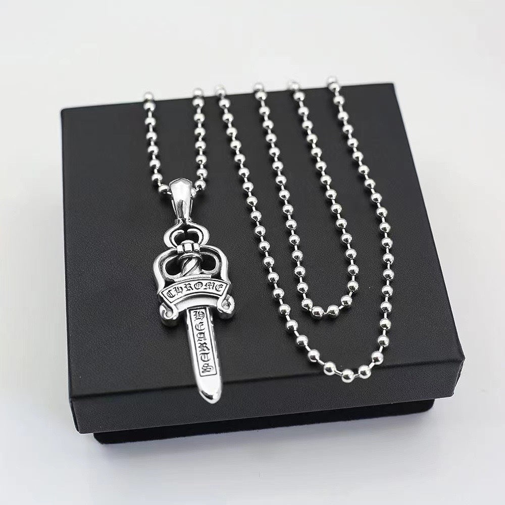 Martin Graham pendant necklace in polished metal-tone – detail view