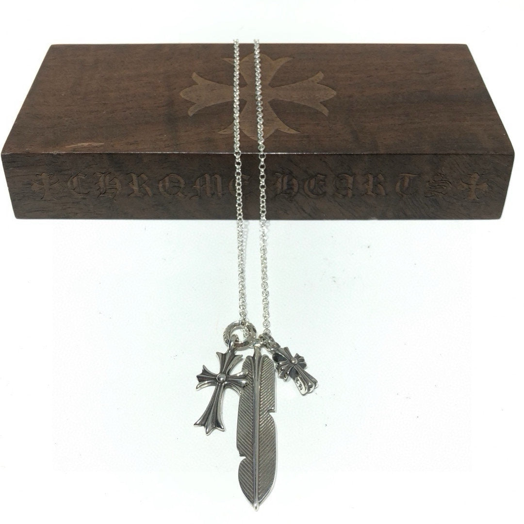 Martin Graham pendant necklace in polished metal-tone – detail view