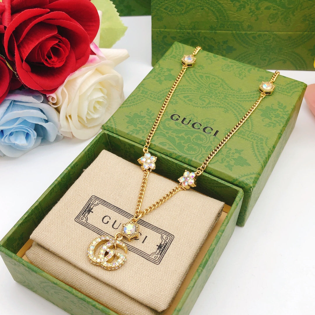 Martin Graham pendant necklace in polished metal-tone – detail view