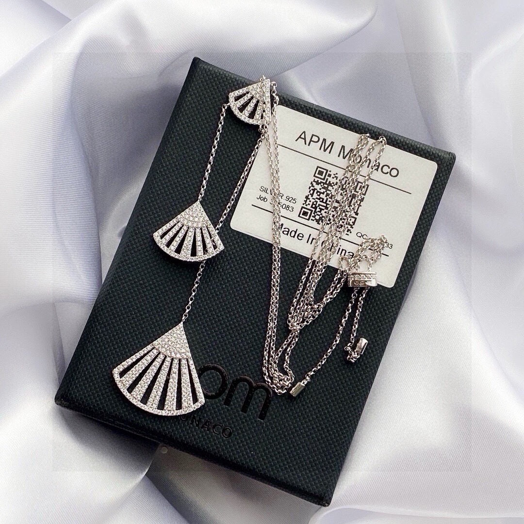 Martin Graham pendant necklace in polished metal-tone – detail view