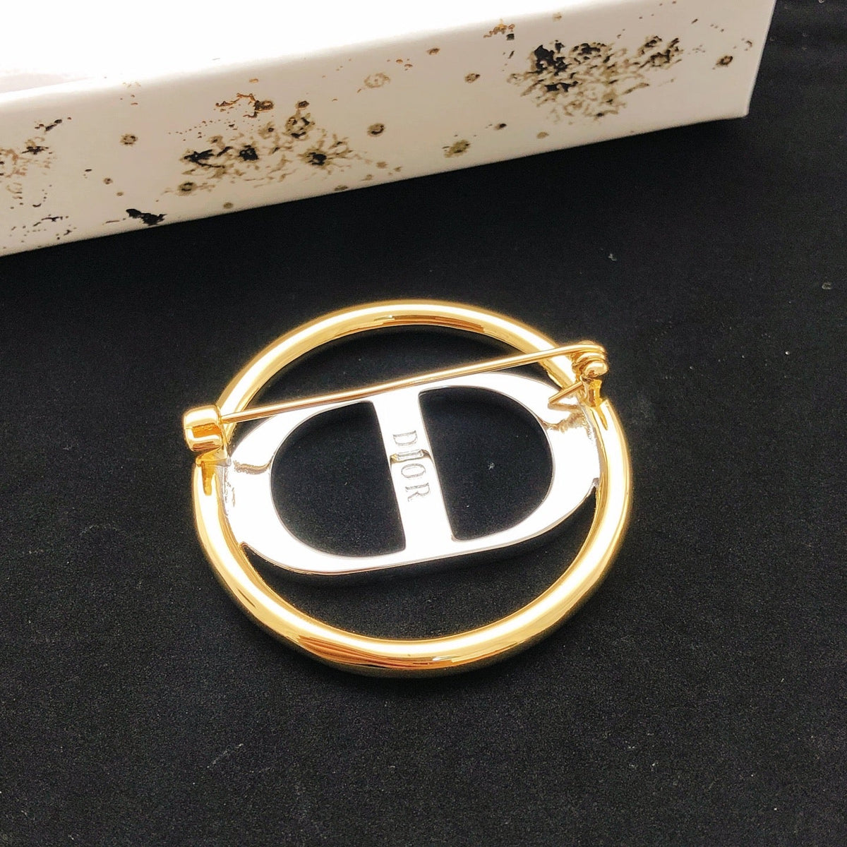 Martin Graham jewelry accessory in polished metal-tone – detail view