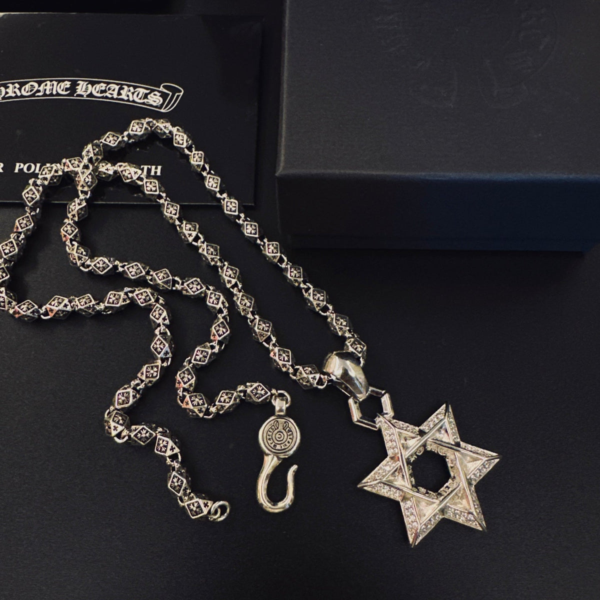 Martin Graham pendant necklace in polished metal-tone – detail view