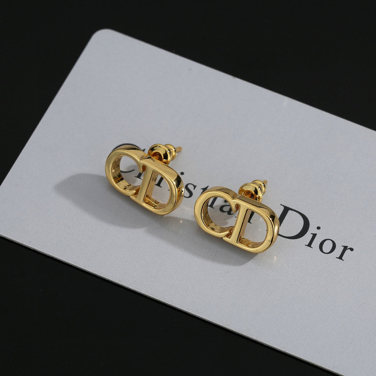 Martin Graham earrings in polished metal-tone – detail view
