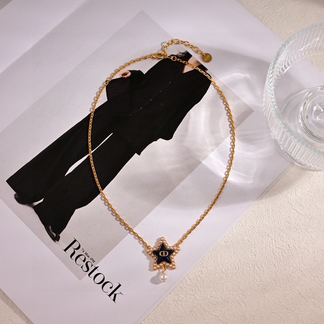 Martin Graham pendant necklace in polished metal-tone – detail view