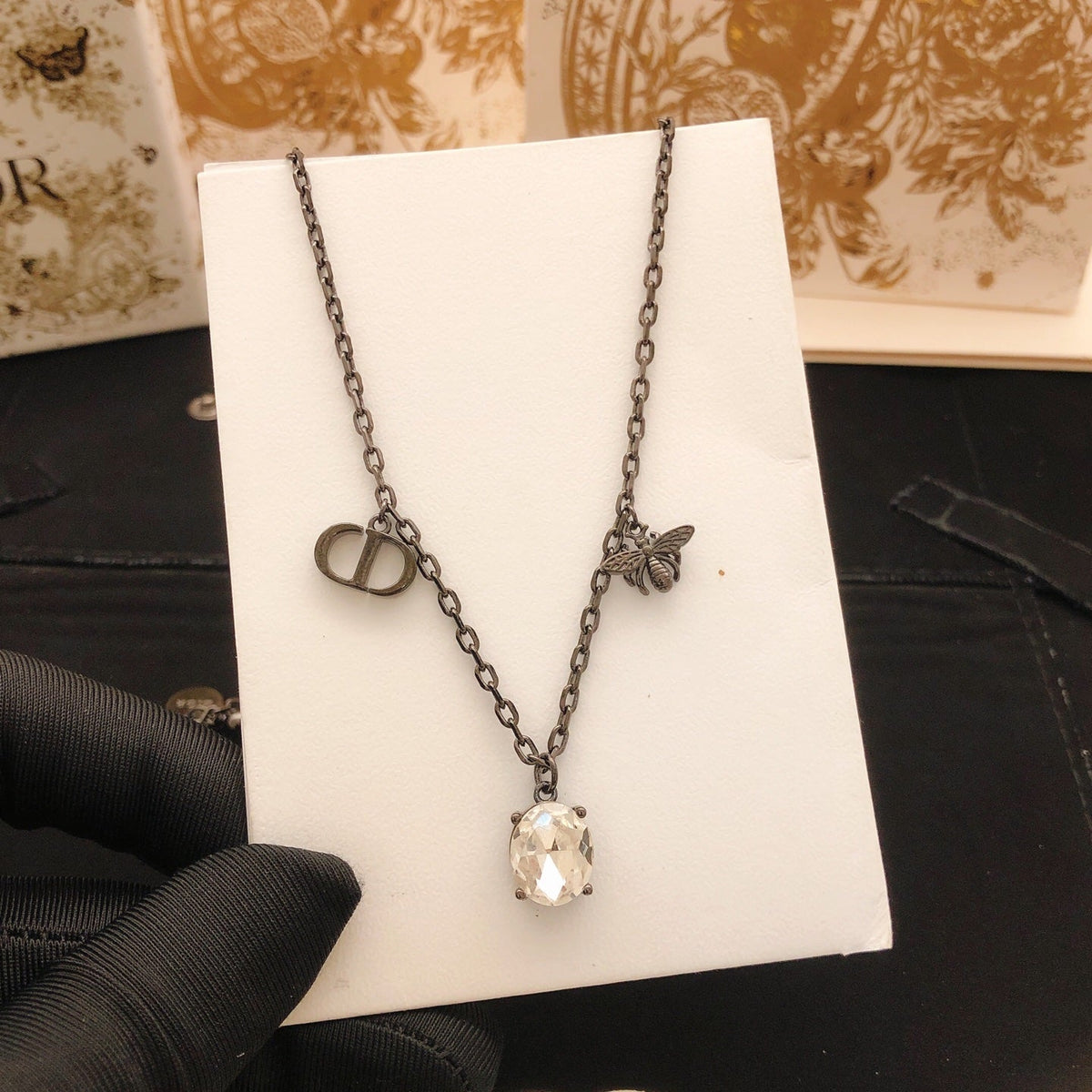 Martin Graham pendant necklace in polished metal-tone – detail view