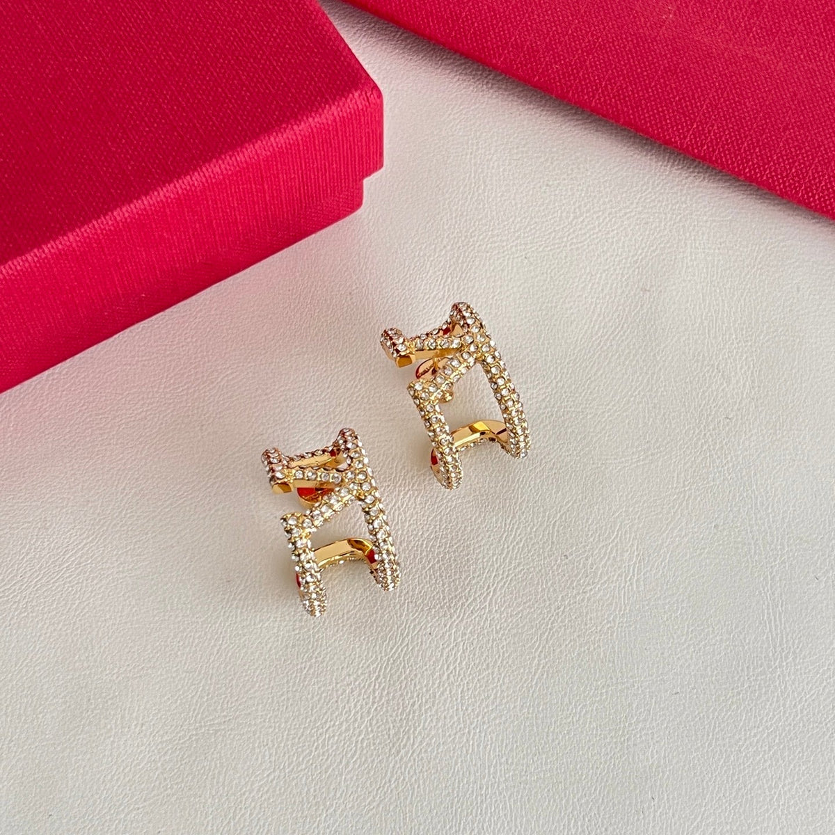 Martin Graham earrings in polished metal-tone – detail view