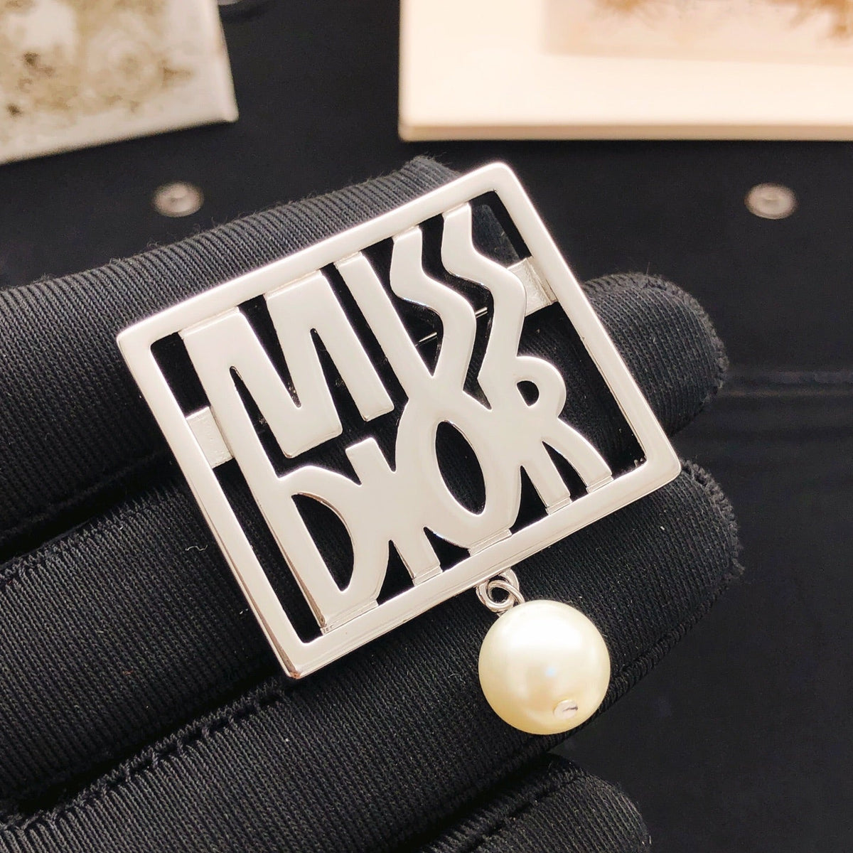 Martin Graham brooch in polished metal-tone – detail view