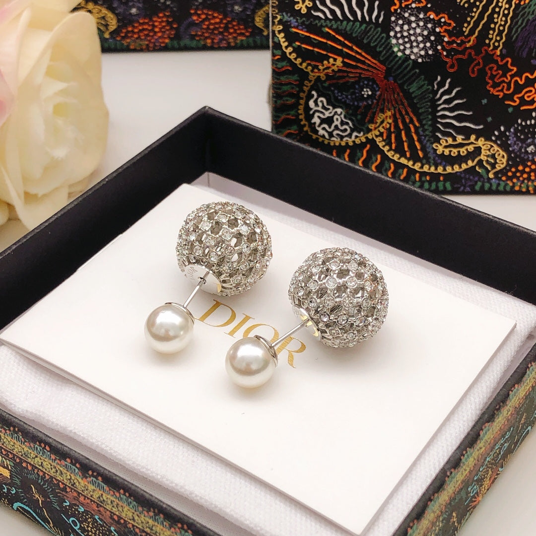 Martin Graham stud earrings in polished metal-tone – detail view