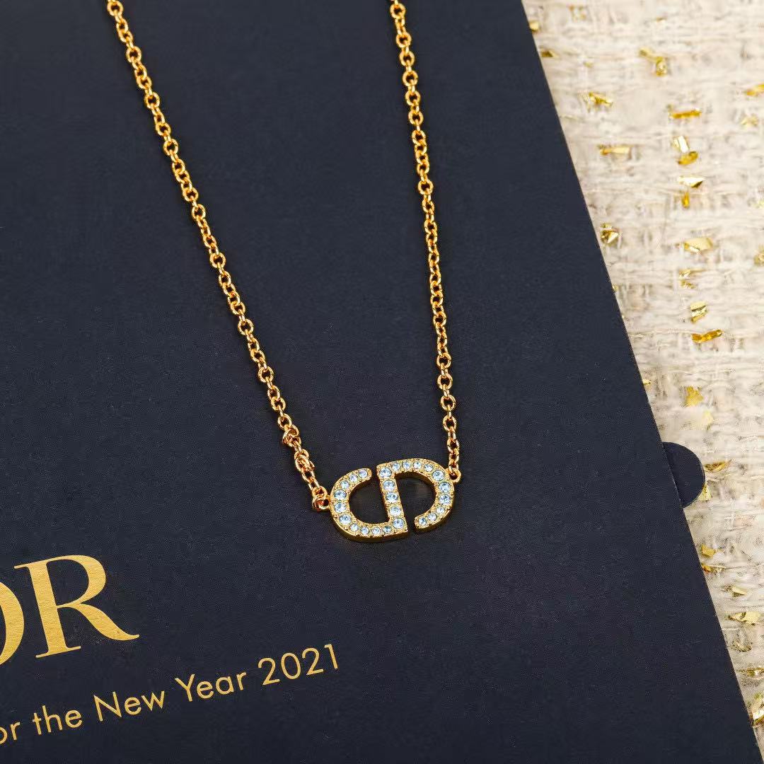 Martin Graham pendant necklace in polished metal-tone – detail view