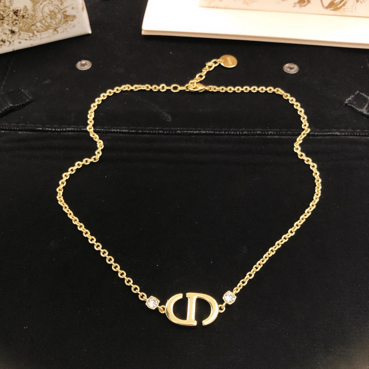 Martin Graham pendant necklace in polished metal-tone – detail view
