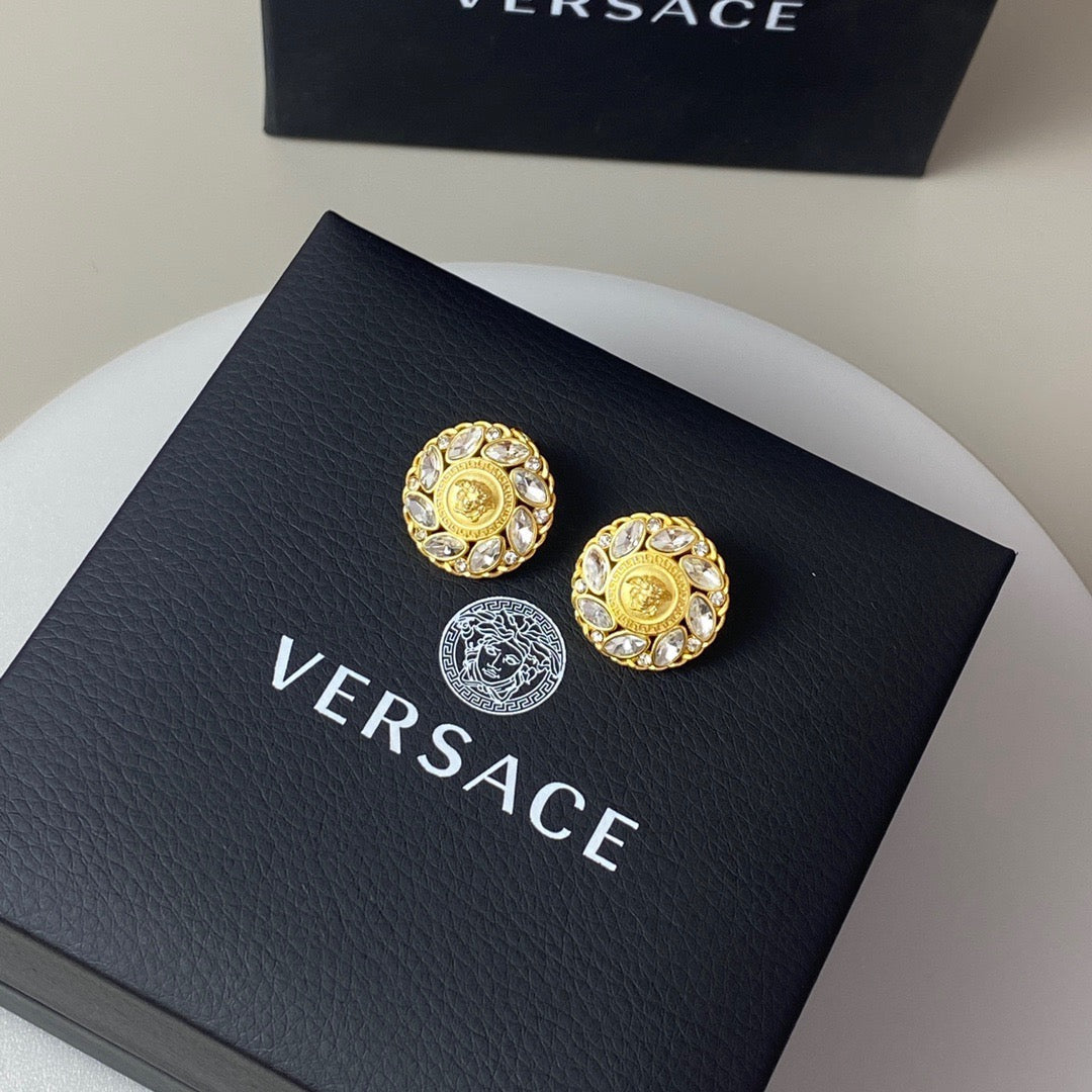 Martin Graham stud earrings in polished metal-tone – detail view