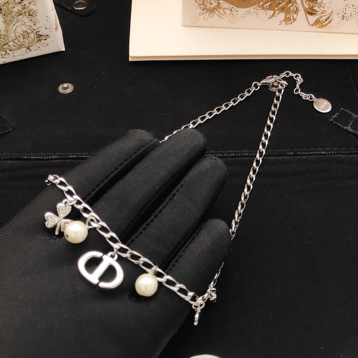 Martin Graham pendant necklace in polished metal-tone – detail view