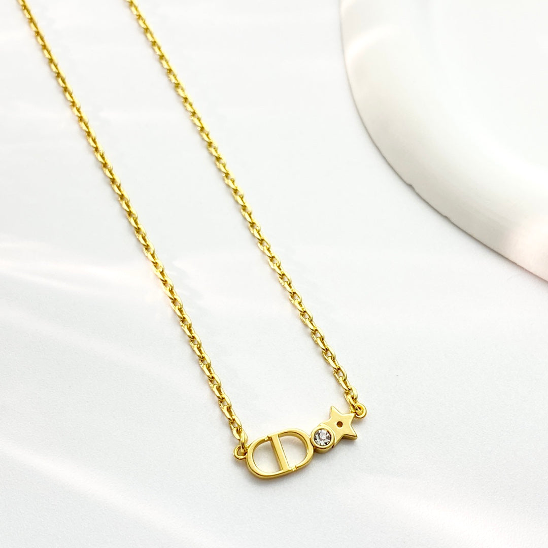 Martin Graham pendant necklace in polished metal-tone – detail view