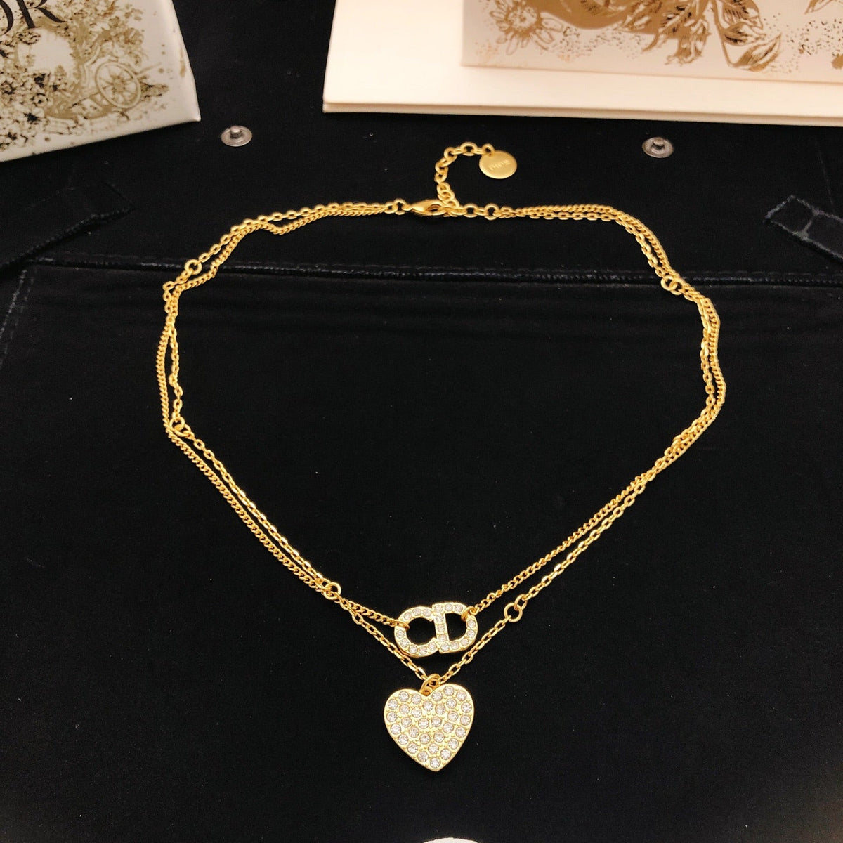 Martin Graham pendant necklace in polished metal-tone – detail view