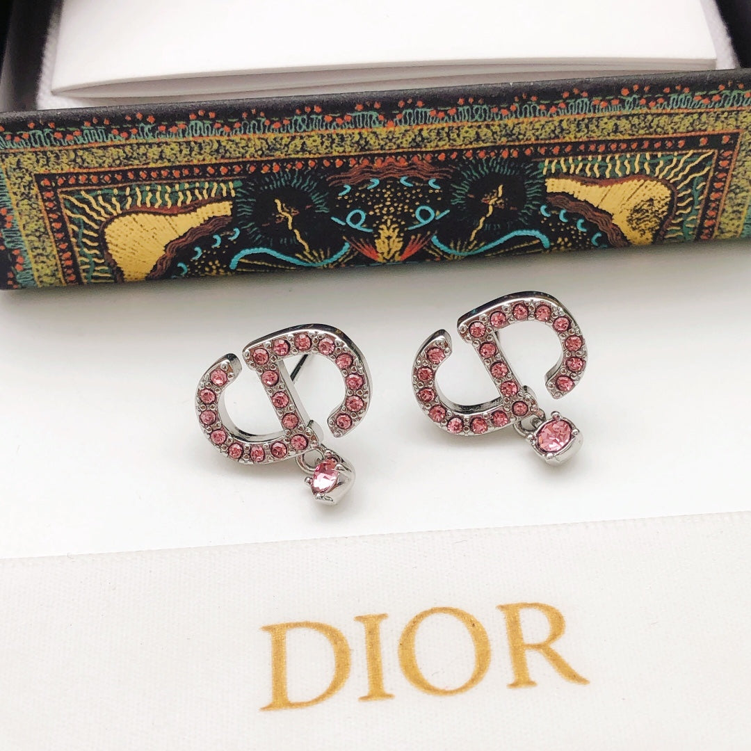 Martin Graham stud earrings in polished metal-tone – detail view