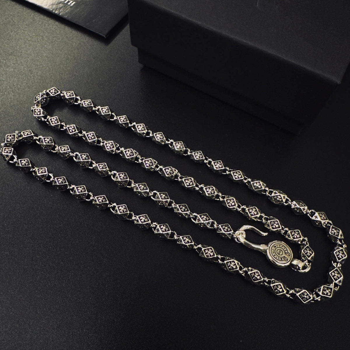Martin Graham pendant necklace in polished metal-tone – detail view