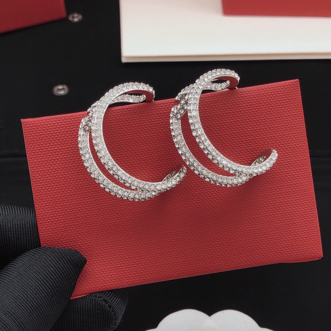 Martin Graham earrings in polished metal-tone – detail view