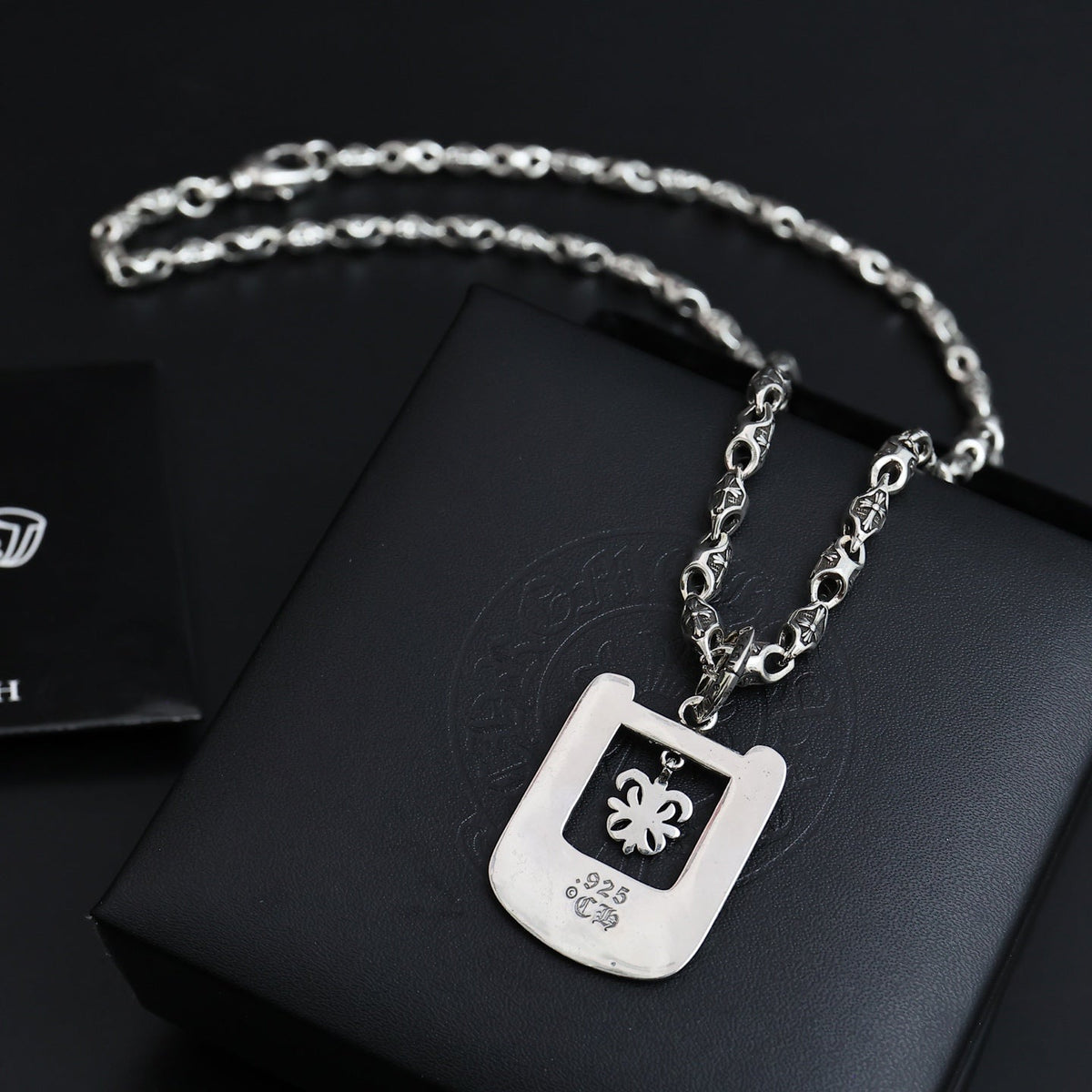 Martin Graham pendant necklace in polished metal-tone – detail view