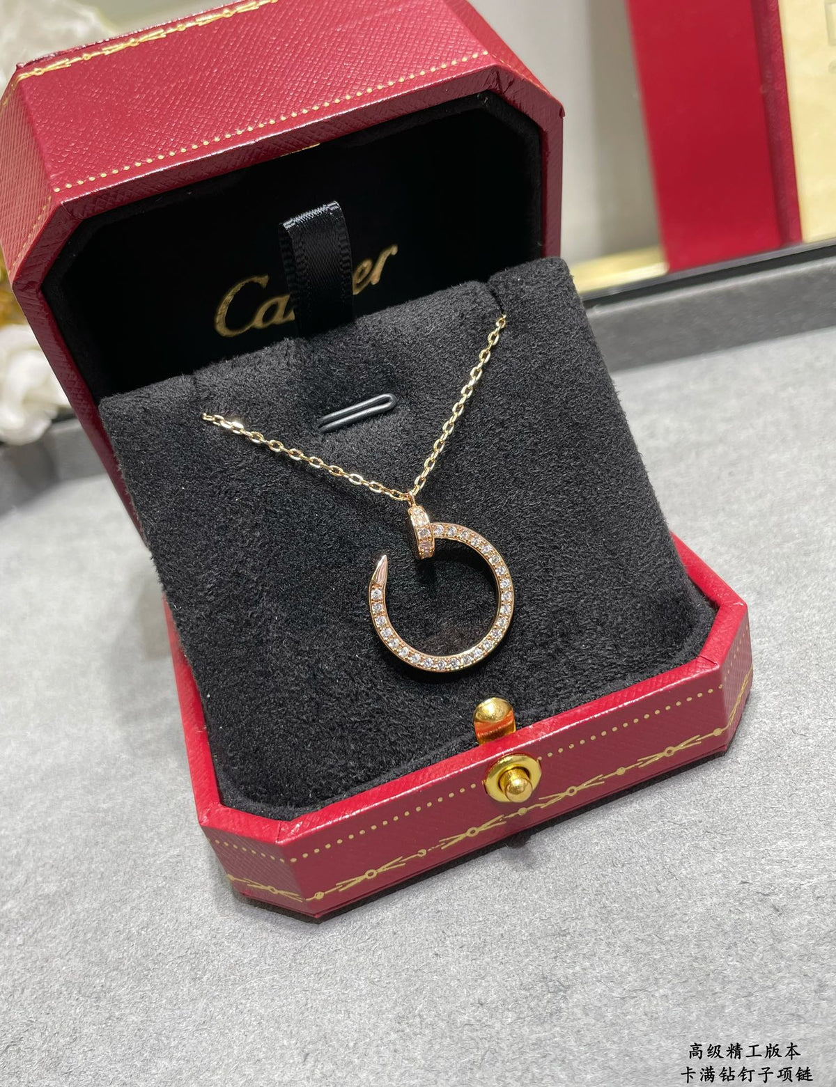 Martin Graham pendant necklace in polished metal-tone – detail view