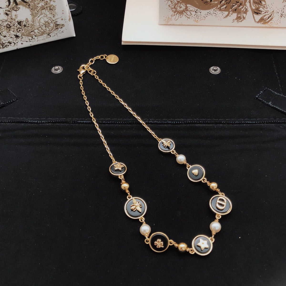 Martin Graham pendant necklace in polished metal-tone – detail view