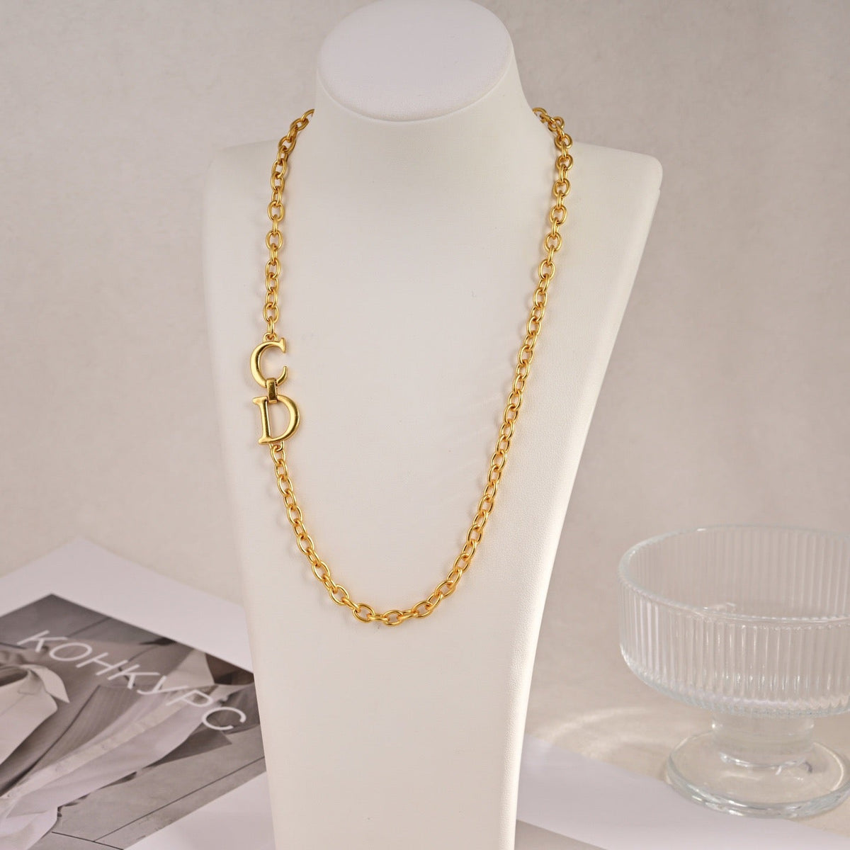 Martin Graham pendant necklace in polished metal-tone – detail view