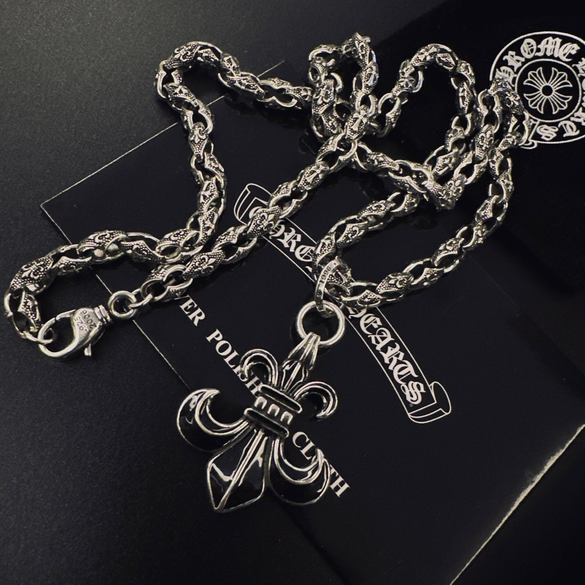 Martin Graham pendant necklace in polished metal-tone – detail view
