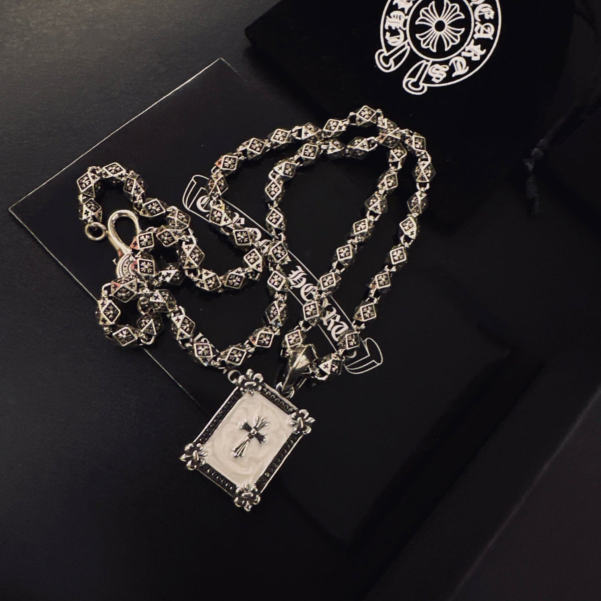 Martin Graham pendant necklace in polished metal-tone – detail view