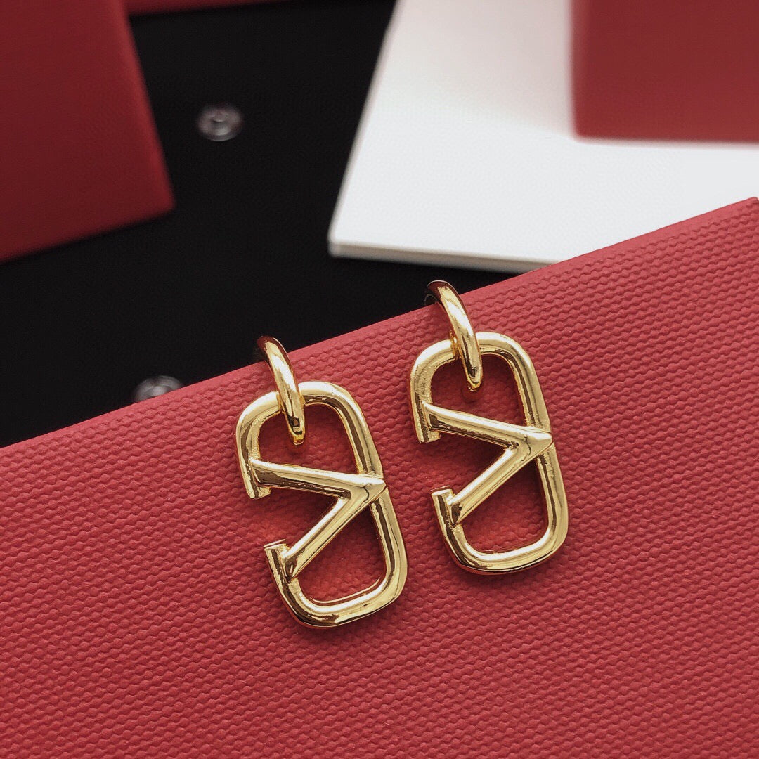 Martin Graham drop earrings in polished metal-tone – detail view