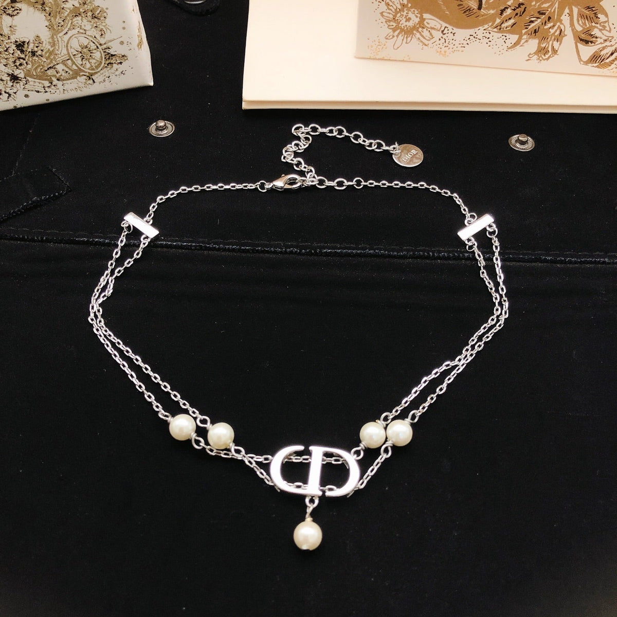 Martin Graham pendant necklace in polished metal-tone – detail view