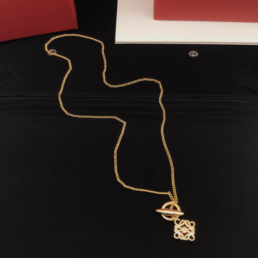 Martin Graham pendant necklace in polished metal-tone – detail view
