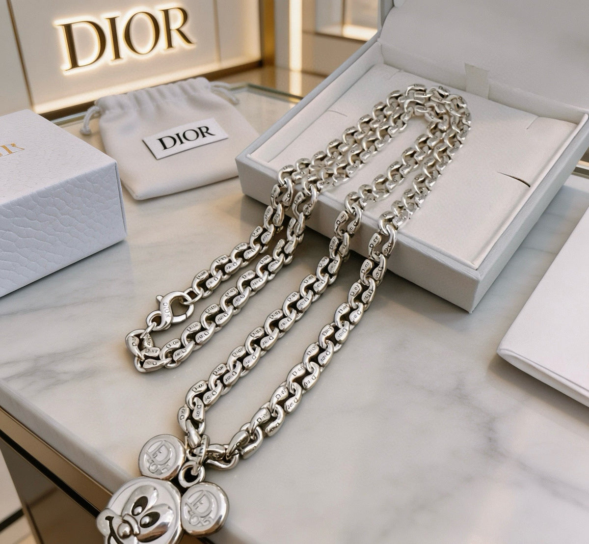 Martin Graham pendant necklace in polished metal-tone – detail view
