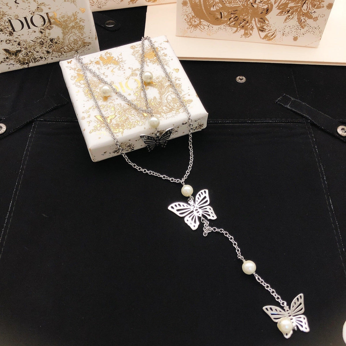 Martin Graham pendant necklace in polished metal-tone – detail view