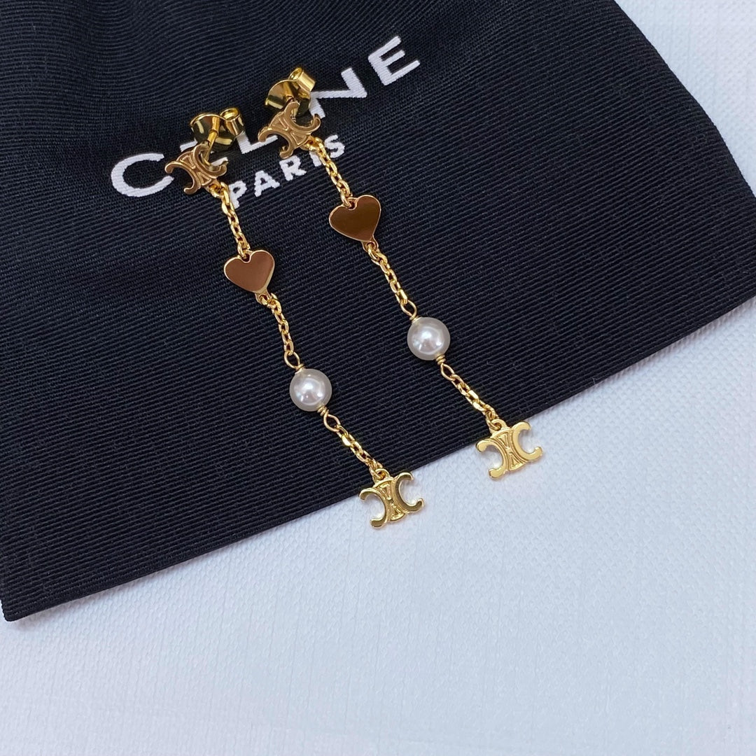 Martin Graham earrings in polished metal-tone – detail view